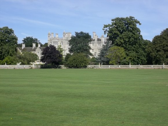 View of Ramsey Abbey across the school playing fields.