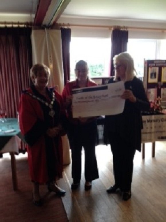 The Mayor presents a cheque to Ramsey Mortuary Chapels